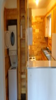 In kitchen washer dryer included with unit.